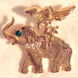 Guardian Angel Elephant lapel pin with Emerald & Clear Crystals gold plated.
